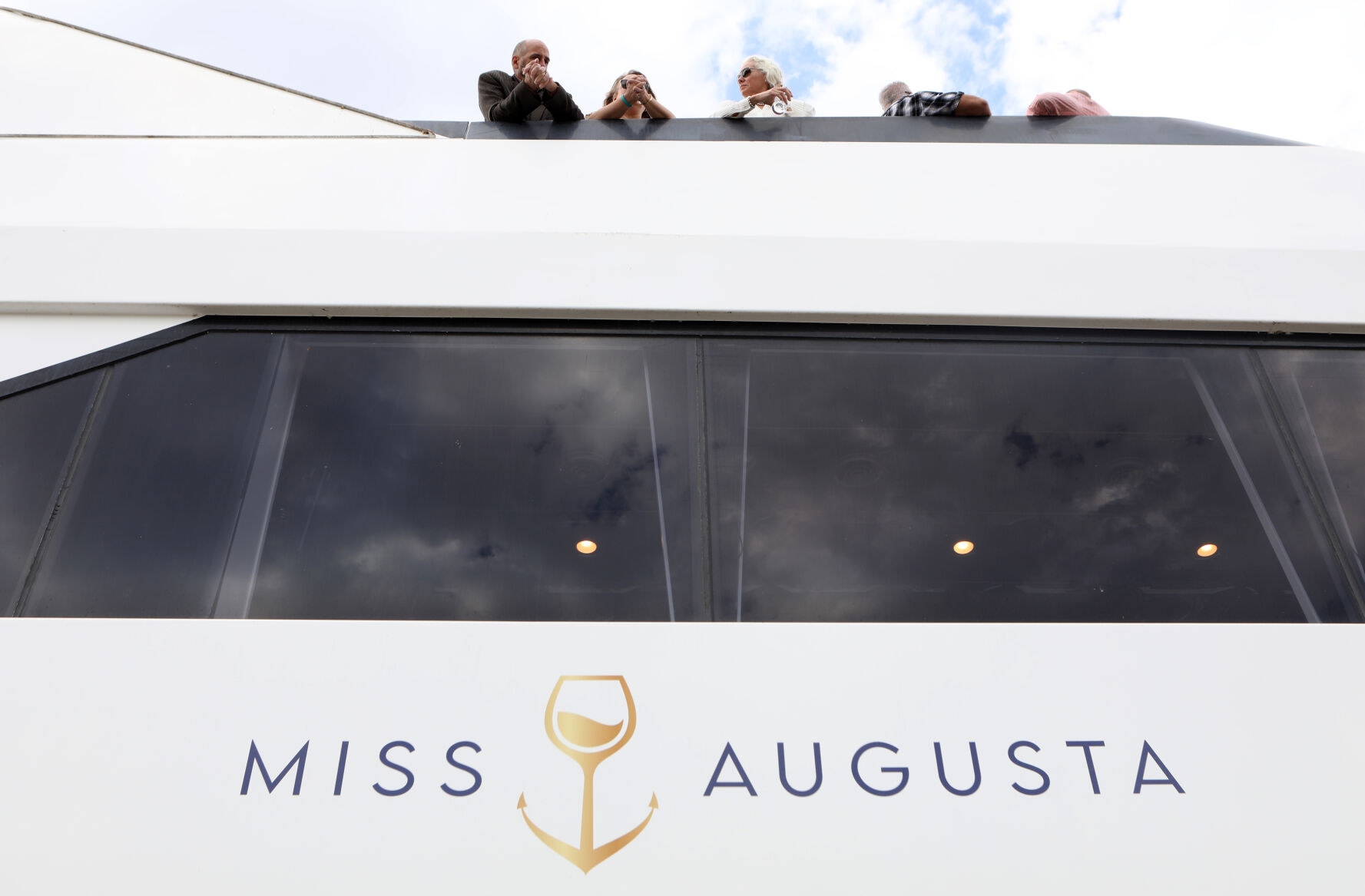 Passengers converse on Miss Augusta